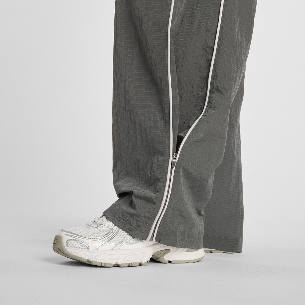 Брюки New Balance Sport Legacy Pant