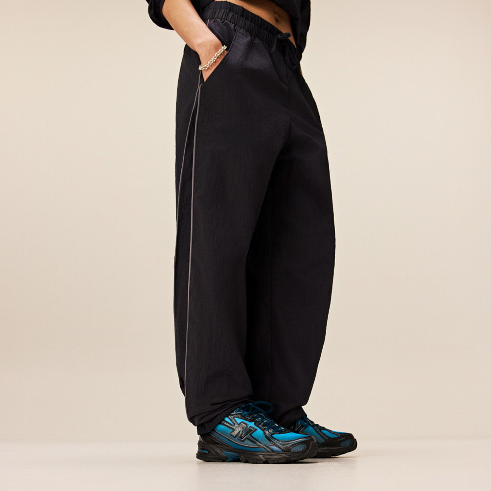 Брюки New Balance Sport Legacy